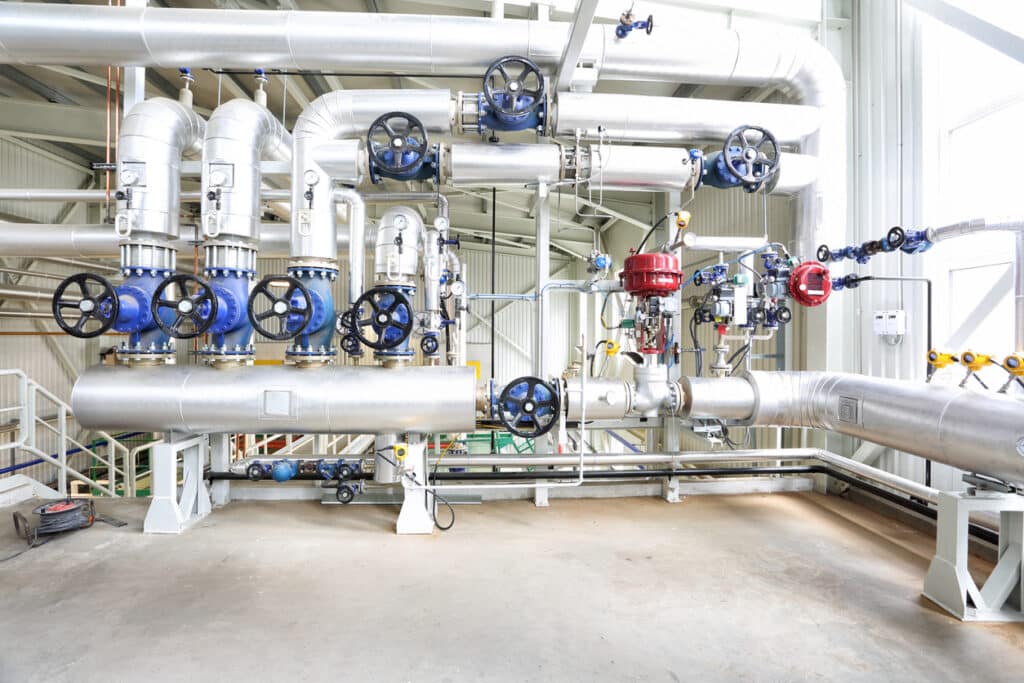 Modern and new boiler room equipment  with many instruments of measurement.